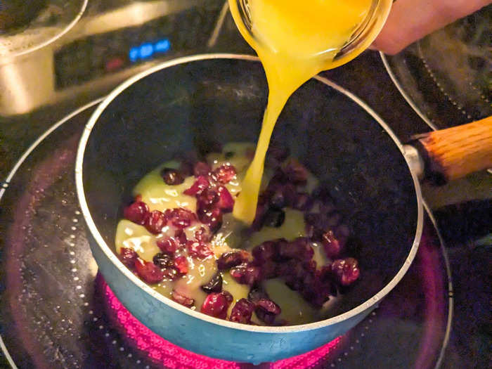 I brought the cranberries and orange juice to a simmer in a small pot.