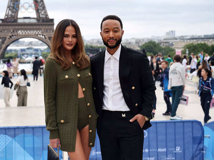 Chrissy Teigen opted for a knitted green outfit as she posed with her husband, John Legend. 