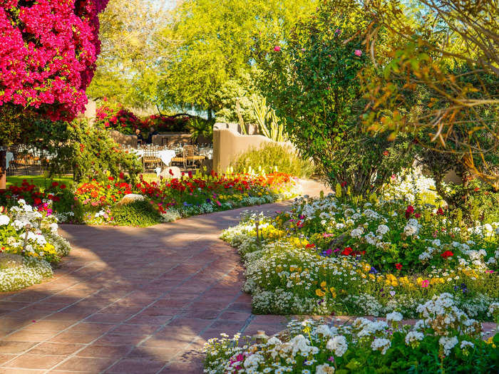 The small property was decorated with garden pathways leading from the lobby to rooms and amenities.