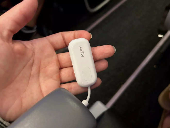 Konstantinides also packs a $55 gadget that allows her to use her wireless headphones on flights.