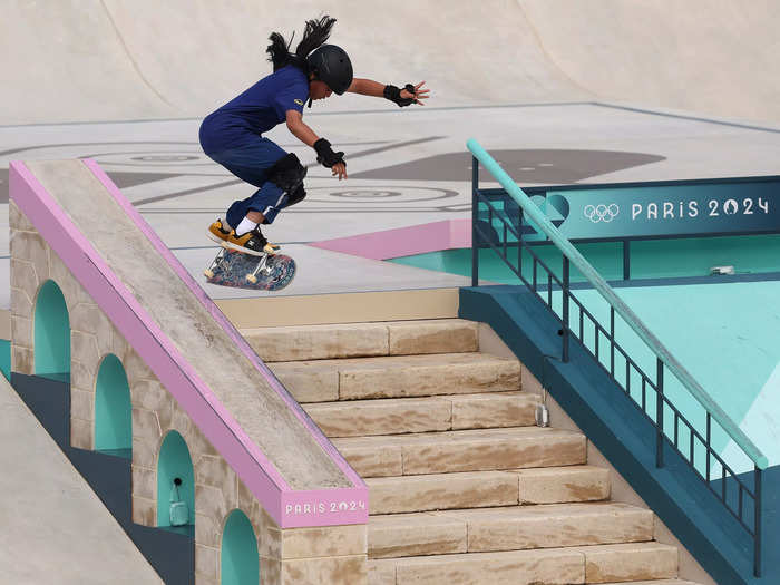 Skateboarder and Thailand flag bearer Vareeraya Sukasem is 12 years old.