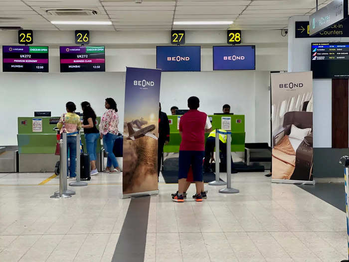 The Male airport has more branding around the check-in desk.