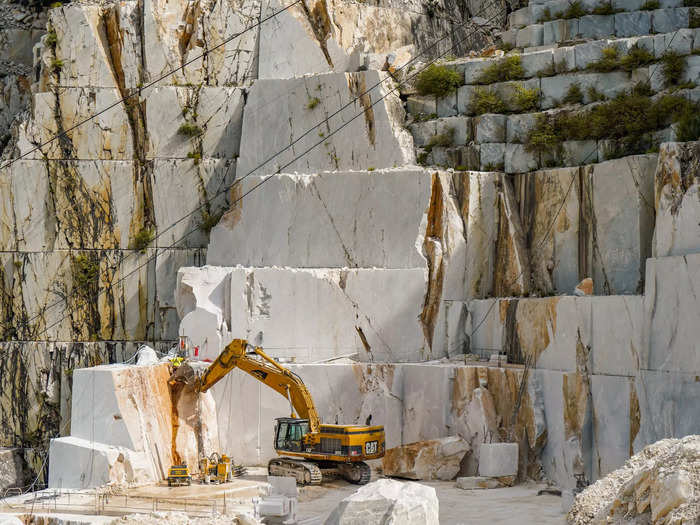 Cutting one giant slab of marble takes about five days. The first four days are spent cutting the slab out of the mountain.