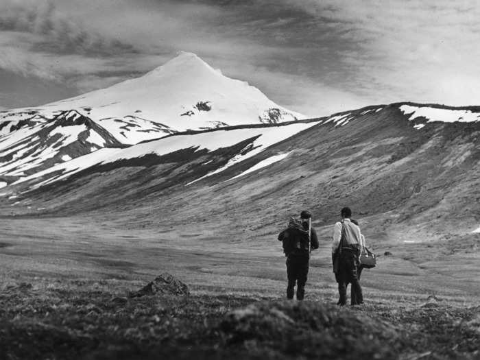 1950: Two explorers take in the views of the Aleutian Islands, nine years before Alaska became a state.