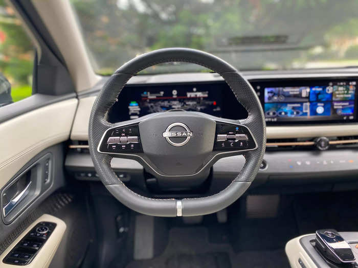 In front of the driver is a heated, leather-wrapped steering wheel. 