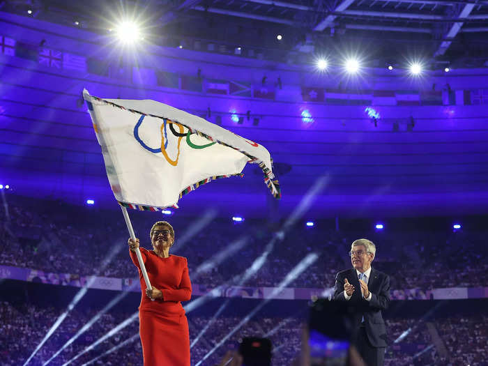 The Olympic flag was lowered and handed off to the mayor of LA.