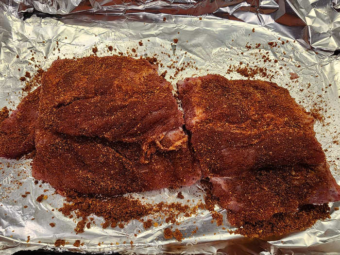 I patted the dry rub over the baby-back ribs.