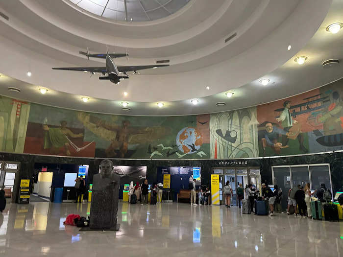 As I walked into the terminal, I was guided by the bright-yellow signs.