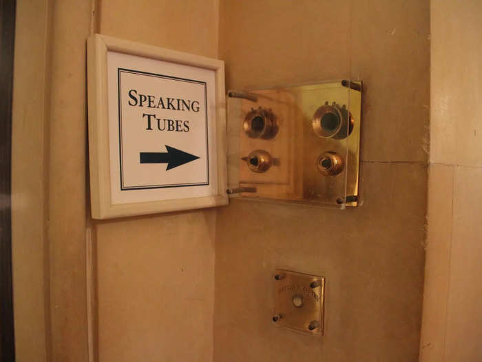 Out in the hallway, speaking tubes allowed servants to communicate with each other in an early intercom system.