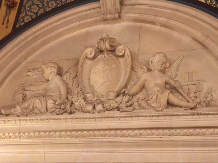 The audio tour pointed out unique details in a fireplace alcove: cherubs accompanied by railroad imagery.