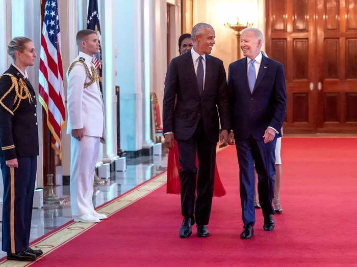 Biden and Obama appeared chummy once again while unveiling the Obamas