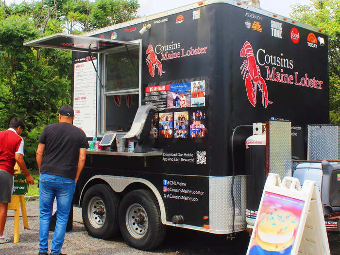 The Cousins Maine Lobster food truck is located right at the base of Portland Head Light in Cape Elizabeth, just across Portland Harbor. 