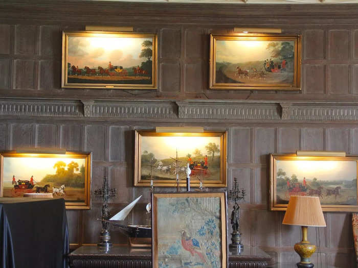 The walls featured paintings of horse racing.