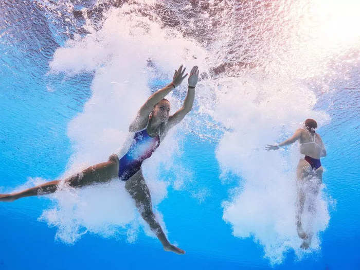 Quinn Rooney used an underwater robotic camera to photograph divers at the women