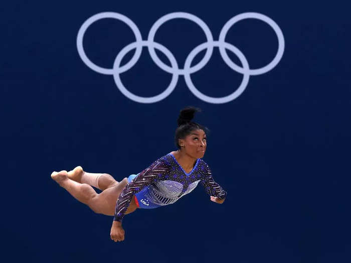 "Poise, beauty, intensity, and resolve are perfect adjectives to describe this legend," Petersen said of photographing Biles.