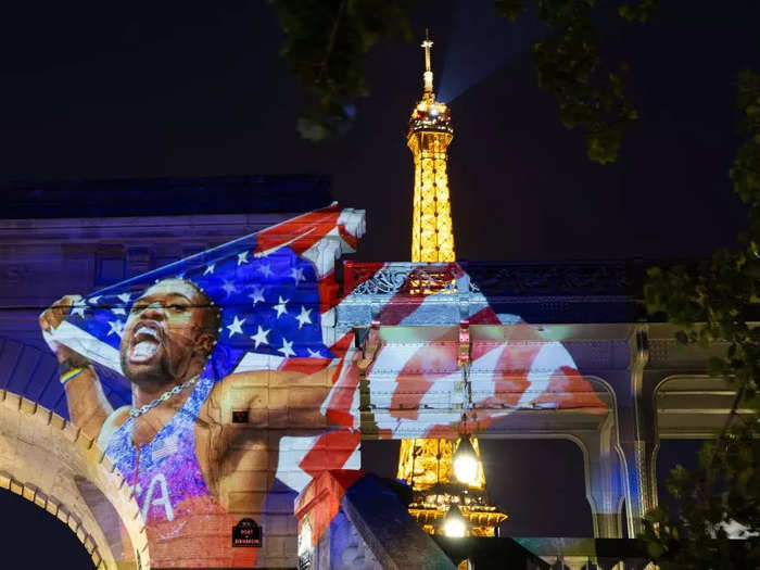 Getty Images photographers projected photos on buildings throughout Paris during the Olympics, including one of the American track star Noah Lyles winning gold.