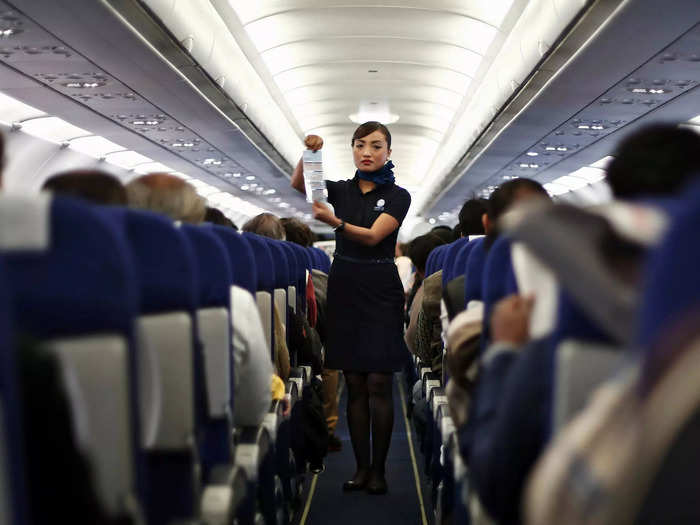 Flight attendants follow safety rules just like anyone else, so be patient when they must remain seated during turbulence.