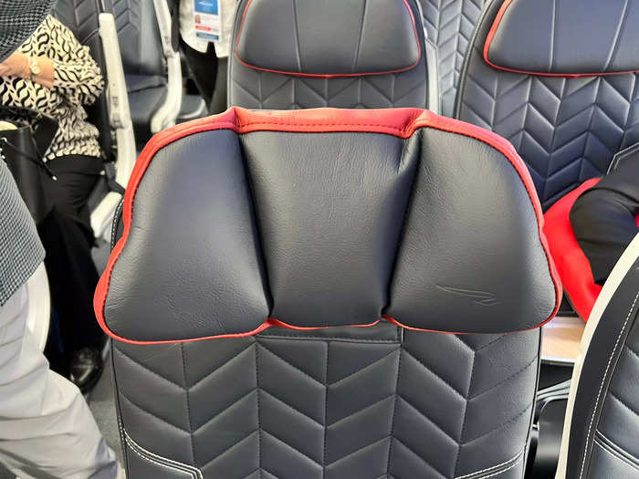 The headrests slide up and down as well as folding in at the sides.