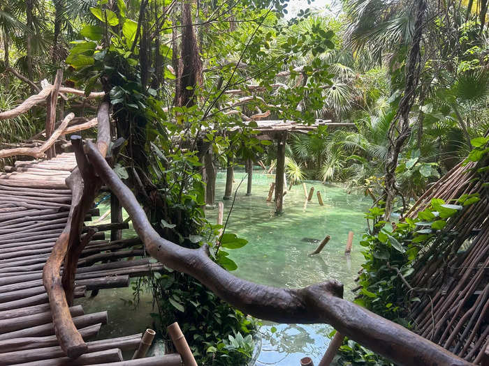 The resort is connected via pathways that wind through trees and soar over waterways. 