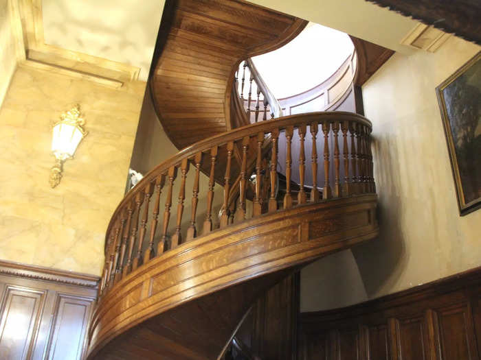 A wooden spiral staircase outside Consuelo Vanderbilt