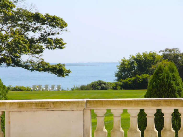 The marble entrance hall led out to a portico overlooking the ocean.