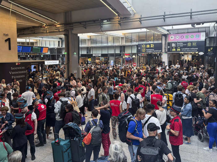 Ahead of the opening ceremony on July 26, train stations were in chaos after a coordinated attack on multiple lines. People were stranded for hours.