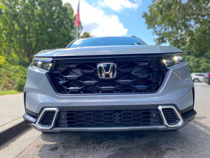 Up front, the CR-V sports a large, upright gloss black grille.