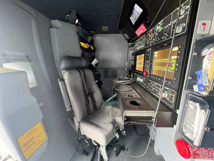 Underneath the cockpit at the front of the plane is the loadmaster