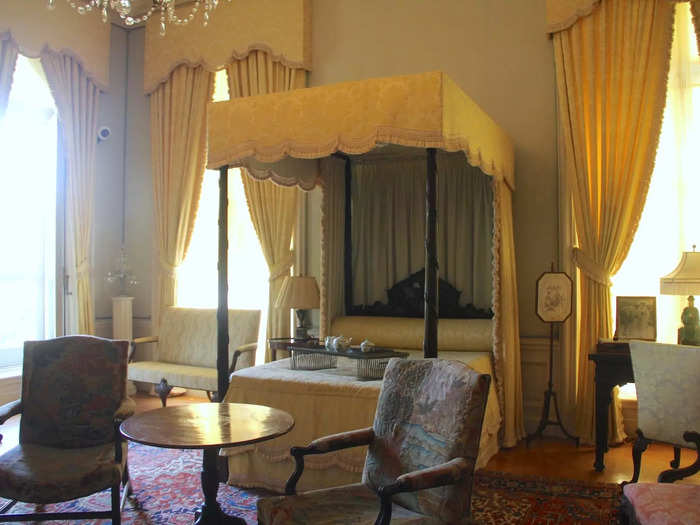 Julia Berwind slept in this room with yellow curtains and a four-poster bed.