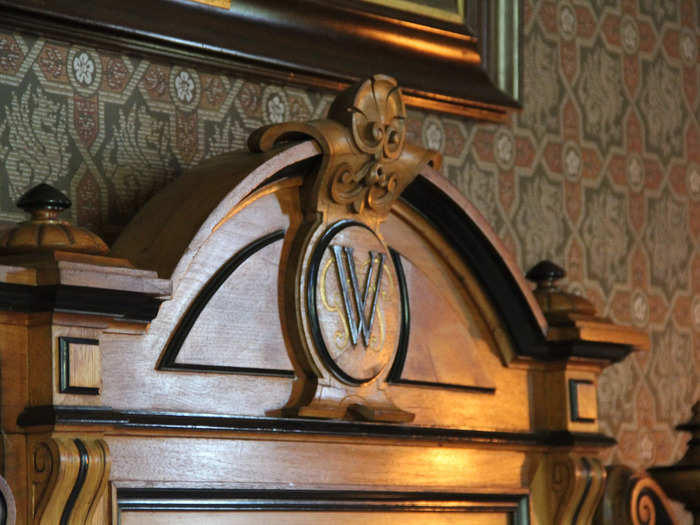 The headboard of the bed featured a monogram with George Wetmore