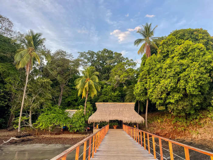 When a thatched roof and long wooden walkway appeared, Francis declared we