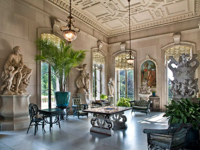 The Elms featured a conservatory, an indoor garden escape with a fountain and French statues.