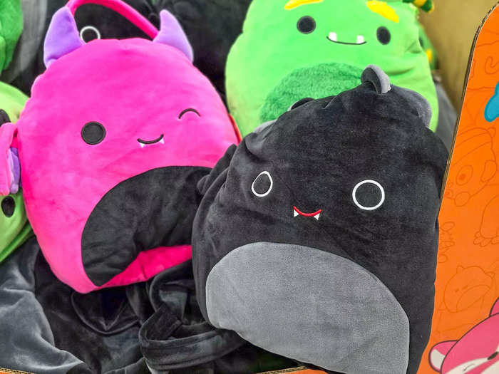 Collect Halloween candy with the Squishmallow plush treat pails.