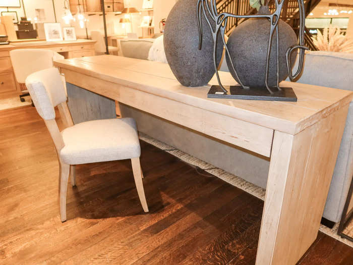 The Pismo reclaimed-wood console desk can serve as a chic workspace.