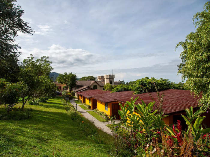 On the other side of the castle was a row of yellow cabins. 