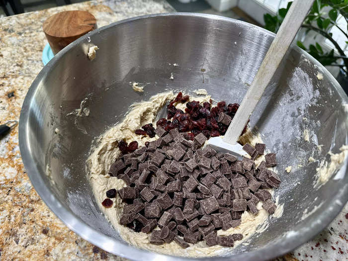 I use a spatula to stir in the chocolate and cranberries.