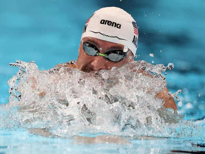 Evan Austin emerged from the water with a splash during the men