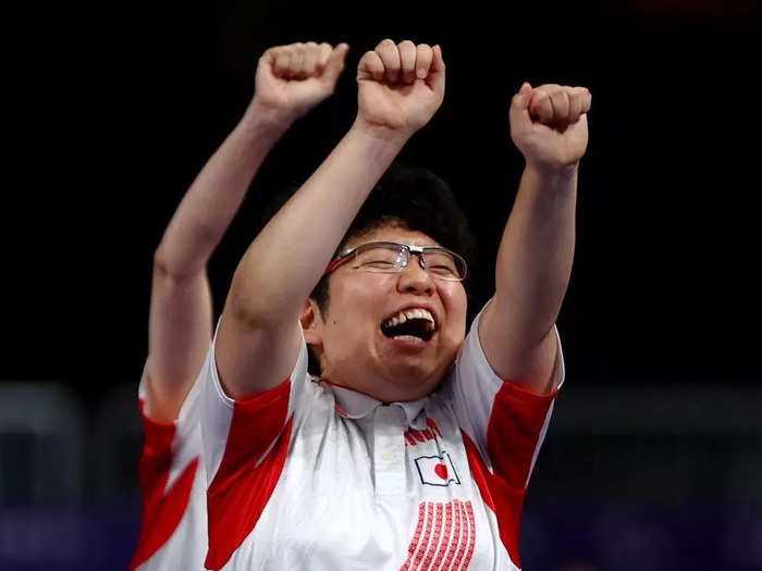 Hiromi Endo of Japan celebrated her bronze medal in boccia, a Paralympic sport, in a photo by Dean Mouhtaropoulos.