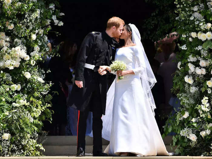 The new Duke and Duchess of Sussex shared their first kiss after marrying at St George