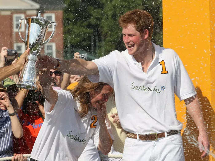 The prince was sprayed with Champagne by a Sentebale teammate after they triumphed over the Blackwatch team during the 2009 Veuve Clicquot Manhattan Polo Classic in May 2009.