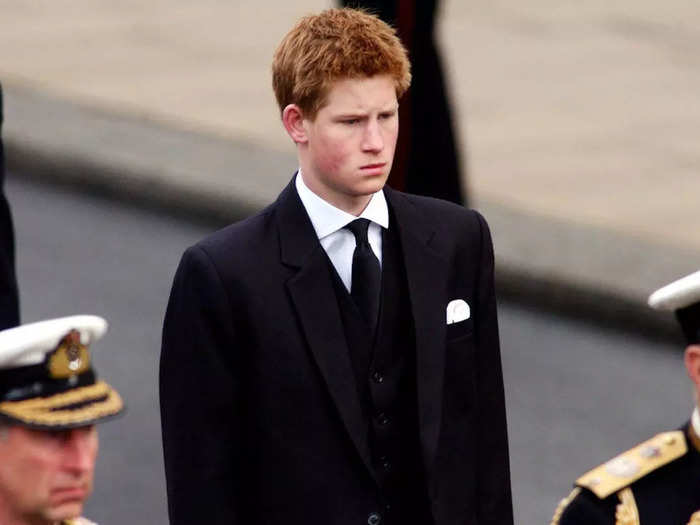 Harry walked behind the Gun Carriage bearing the coffin of the Queen Mother at her funeral on April 9, 2002.