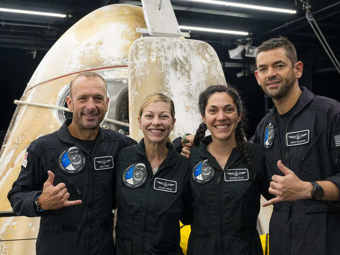 "We are mission complete," Isaacman radioed from the capsule as it bobbed in the water. Shortly after, a SpaceX ship recovered the capsule, and the crew emerged after their successful five-day mission. 