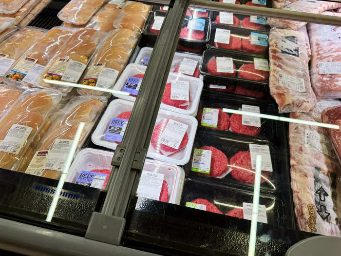 The meat aisle extended into a section with burger patties and ribs. 