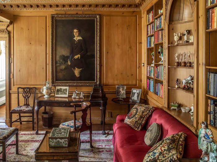 The second floor featured a library smaller than the one on the first floor, but decorated in a similar style with wood paneling and portraits.