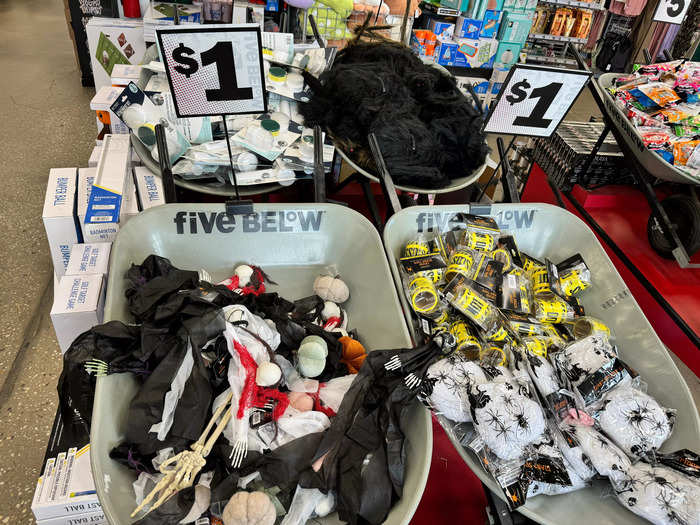 As soon as I walked in, I was greeted with wheelbarrows filled with $1 Halloween accessories.