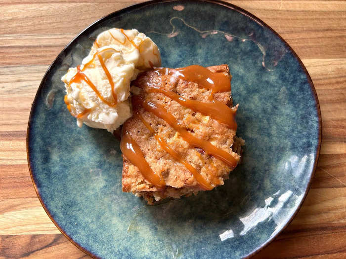 I cut my cake into squares and served each slice with vanilla ice cream and drizzles of caramel. It looked — and tasted — like an absolute delight.