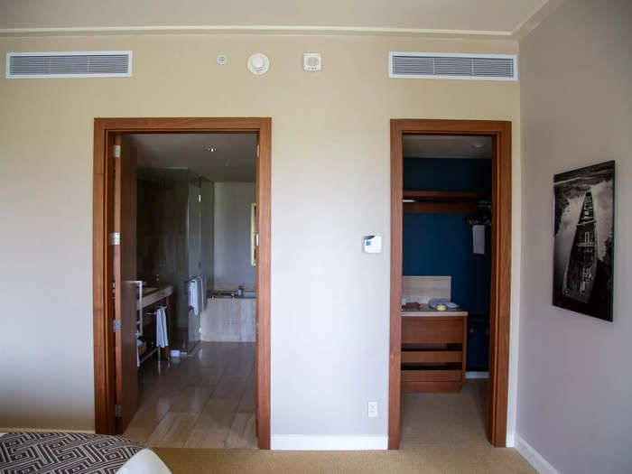 The other wall had two doors leading to a closet and bathroom. 