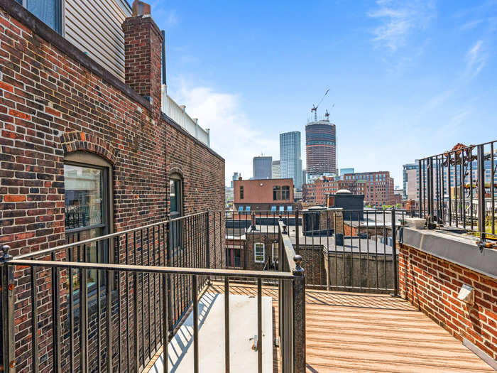 The stairs in the suite lead to the rooftop deck, from which you can see a view of the city.