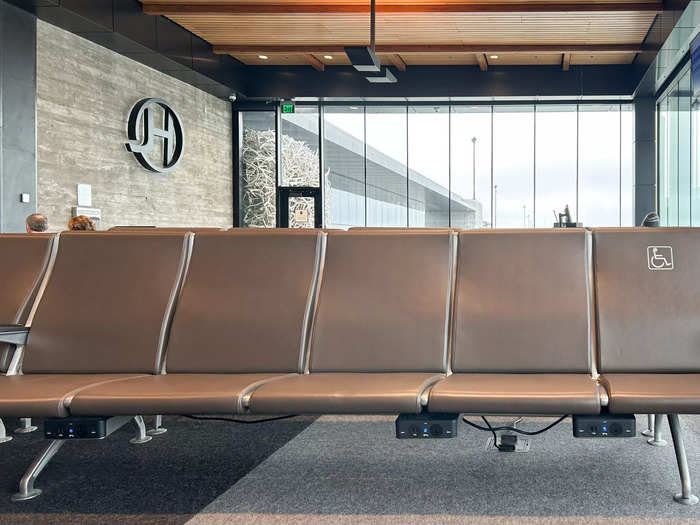 At the gate, I spotted updated charging ports beneath the chairs — and a stellar view.