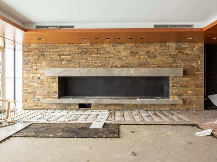 Details like this large fireplace give a glimpse at how glamorous the property could have been.